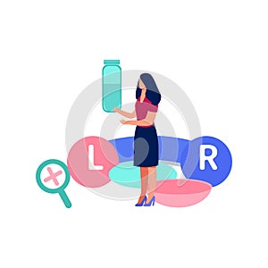 The girl is showing a box of lenses