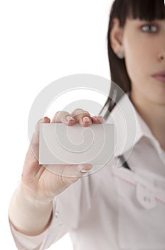 Girl showing business card in her hands