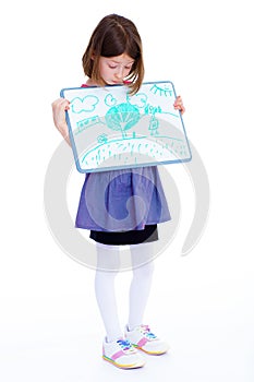 Girl showing her drawing