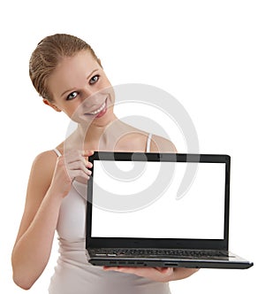 Girl showing laptop with empty space screen