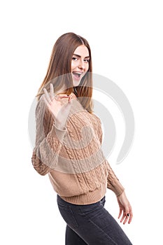 The girl shows that everything is good on a white background