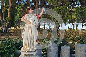 Girl shows hand gesture as philosophers in ancient Greece