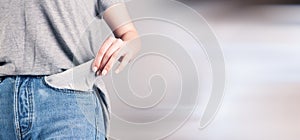 Girl shows her empty pockets