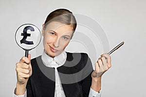 Girl with a sign with image of british pound