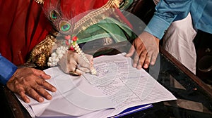 A girl signing on her marriage papers, Marriages in Pakistan, Pakistani marriage papers, Nikkah nama.