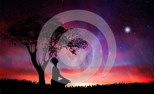 Girl silhouette under a tree, meditation in nature, under stars