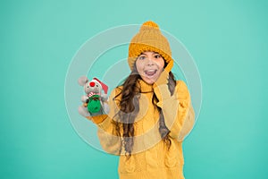 Girl sincere emotional child hold rat or mouse toy. Come play with me. Happy childhood. Rat symbol year. Plush toy