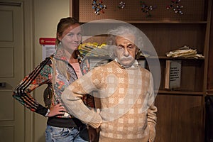 Young Girl Standing by Albert Einsten at Madame Tussauds