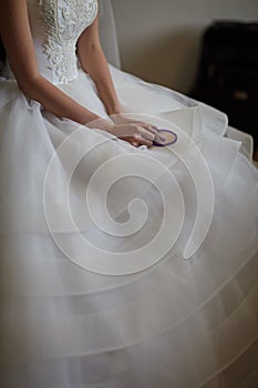 Girl sitting in a beautiful wedding dress