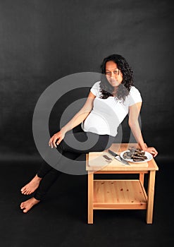 Girl sitting by beef biltong - African dried meet