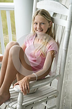 Girl sitting in chair