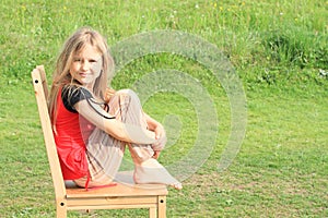 Girl sitting on chair