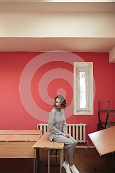 Girl sitting in classroom