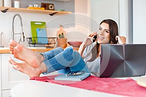 Girl sitting confortable talking on the phone