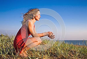 Girl sitting on a dune-4