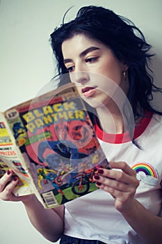 Girl reading comics