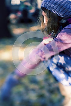 Girl sitting in the nature