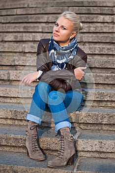 Girl sitting on the stairs