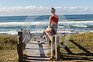 Girl Sitting Stairs Beach Waves