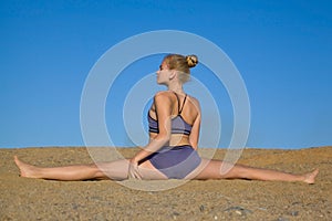 Girl sitting in twine outdoors