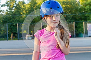 Girl skateboarding on natural background