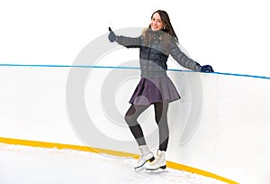 Girl skater on the ice in an isolated background