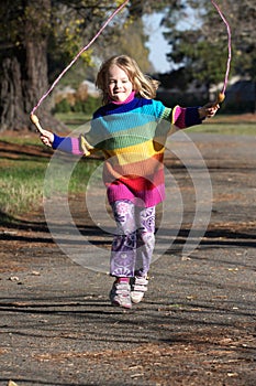 Girl skipping photo