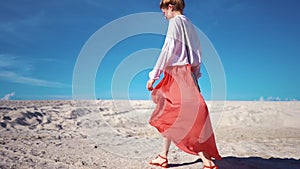 Girl in skirt fluttering in the wind