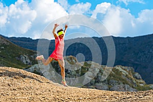 Girl skyrunner trains downhill