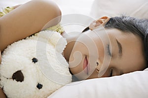 Girl Sleeping In Bed With Teddy Bear