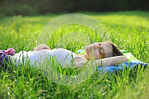 Girl is sleeping in the grass