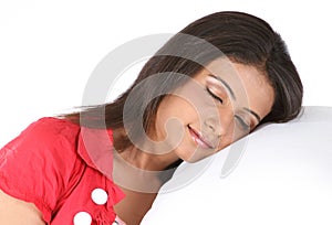 Girl sleeping with a white pillow