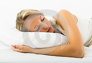 Girl sleeping on white pillow