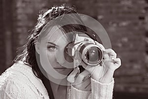 Girl with SLR photo camera