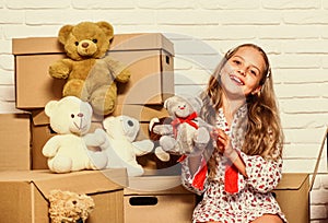 Girl small child and boxes. Delivering your purchase. Moving routine. Packaging things. Prepare for moving. Rent house