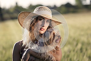 Girl with small dog, Yorkshire