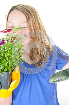 Girl smelling flowers