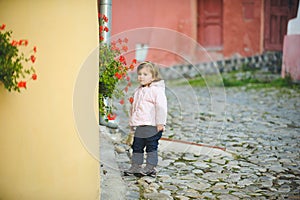 Girl Smelling Flowers