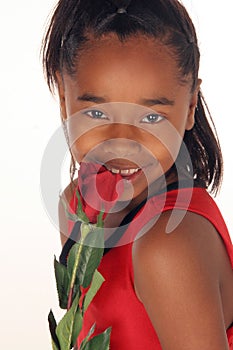 Girl smells her red rose