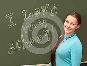 The girl smiles at the English class