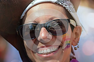 Girl smiles at the gay pride