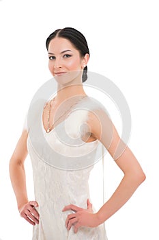 Girl on smiling face dressed in luxury dress with fur posing with posture. Dancer of ballroom dance looks gorgeous