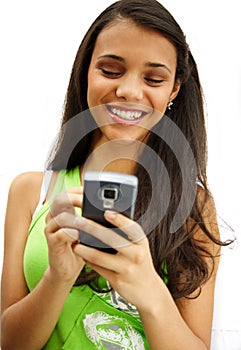 Girl smiling with her cellphone