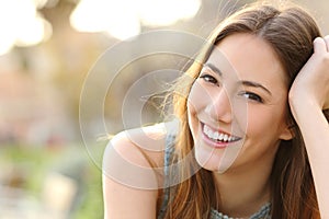 Girl smiling with perfect smile and white teeth photo