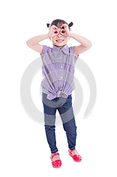 Girl smiling while standing over white background