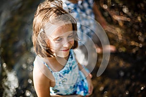 Girl smiling in the sun