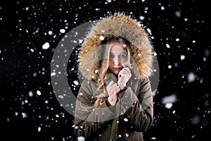 Girl in snow feeling cold