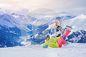 Girl snowboarder enjoys the winter ski resort.