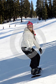 Girl snowboarding