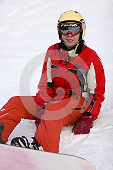 Girl snowborder after incidence photo